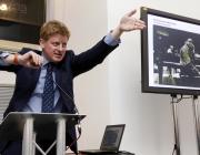 Sotheby's auctioneer Adrian Biddell gesticulates as he takes bids