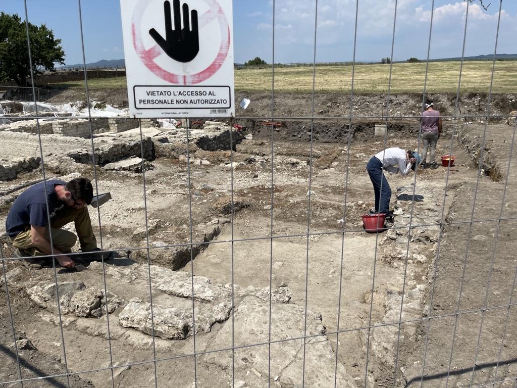 Archaeologists hard at work uncovering architectural and materials remains at Vulci, Italy.