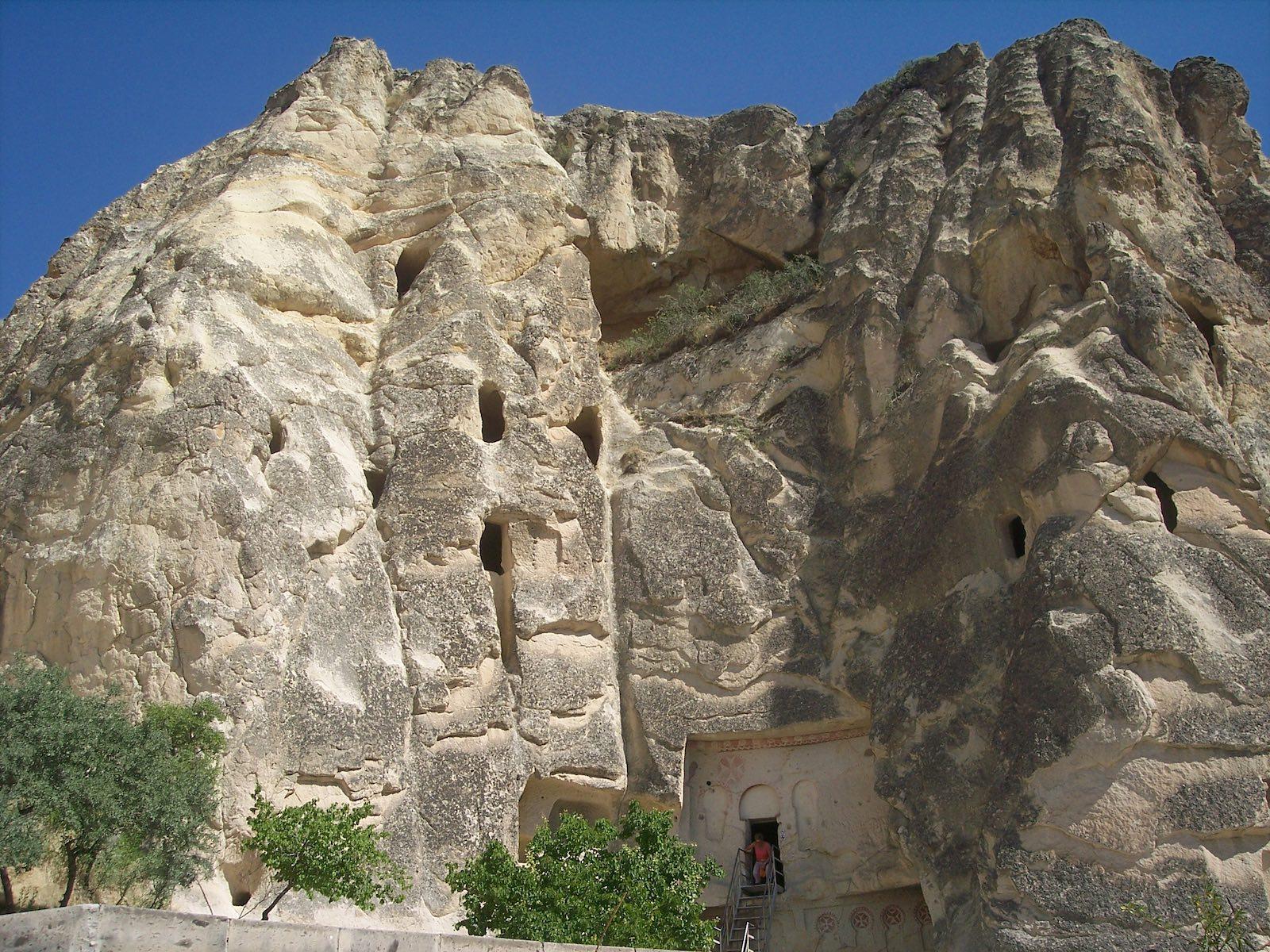 Exterior view of the rock-hewn Sandals Church (or Carikli Kilise), named for the two footprints found by the fresco at the entrance.