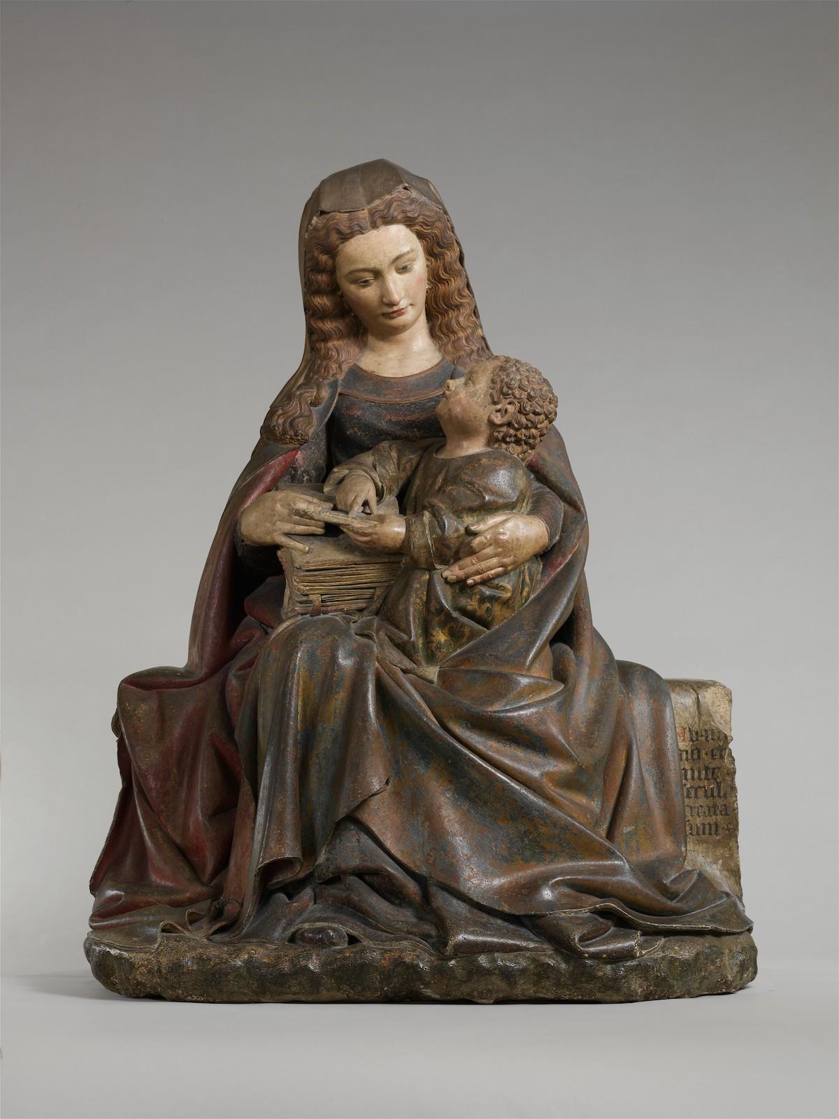 Claus de Werve, Virgin and Child, c. 1415 - 17. Limestone with paint and gilding. 53 3:8 x 41 1:8 x 27 in. The Met. Rogers Fund, 1933. 33.23