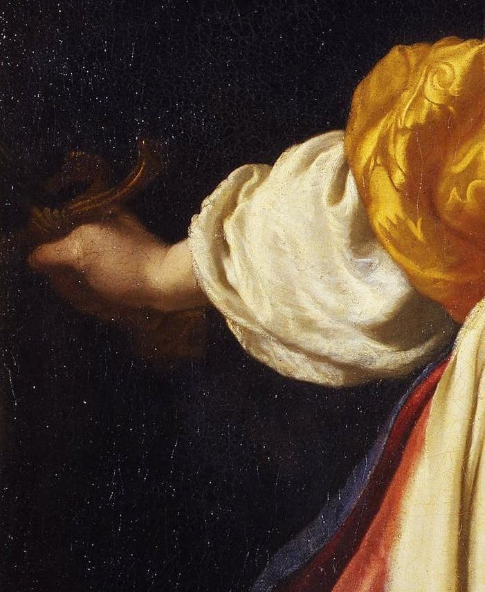 detail of previous painting's edge, features Judith's arm and the hilt of the sword.