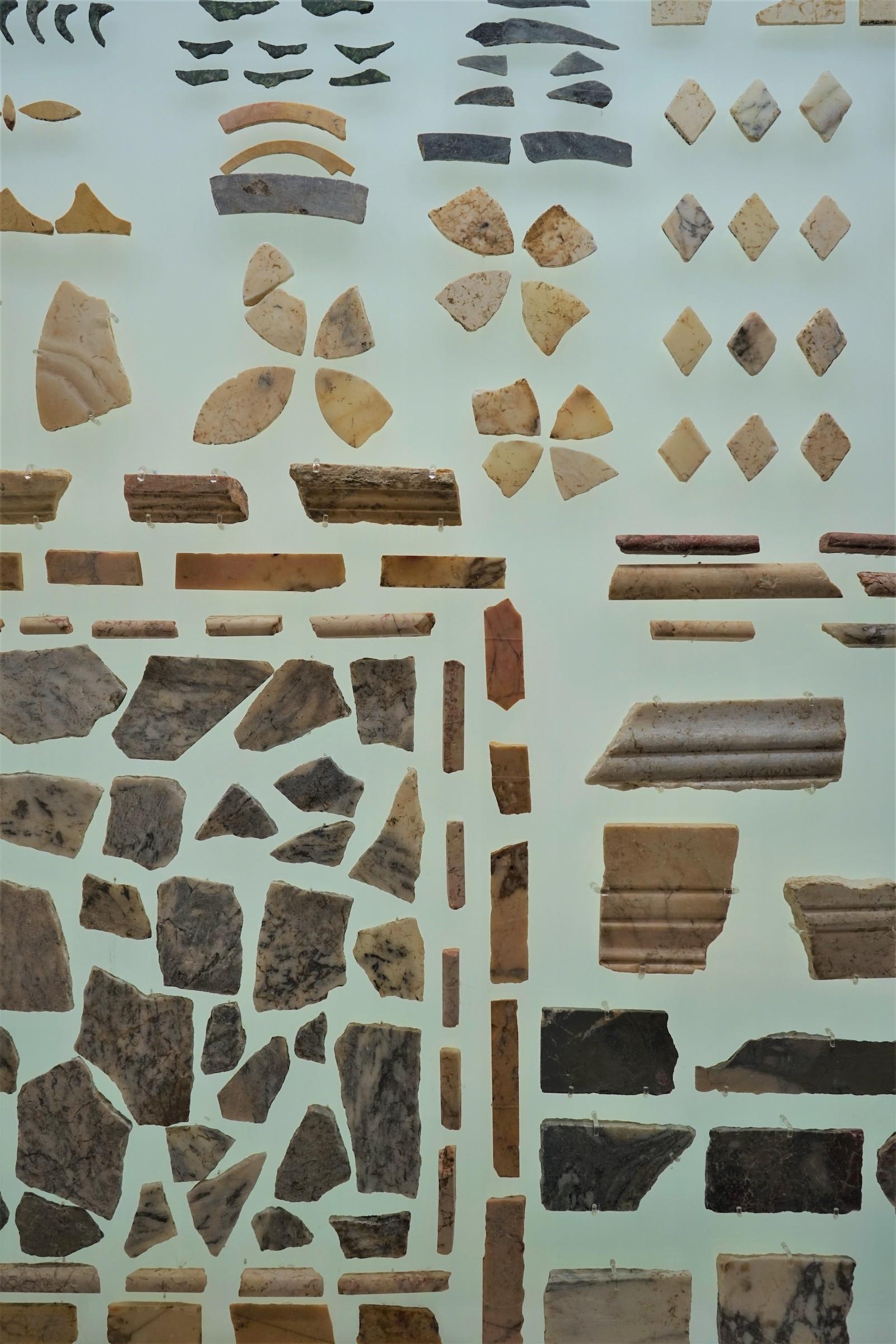 Fragments of colored marble wall decoration (opus sectile). Photo by Christopher Siwicki.
