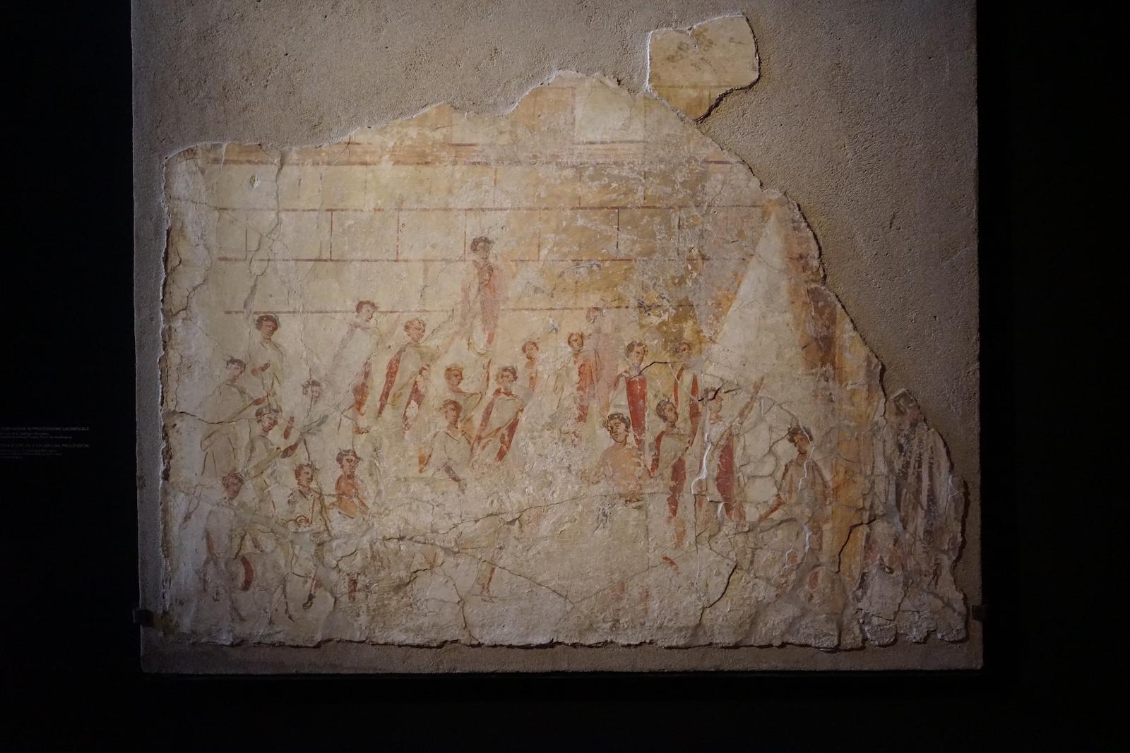 Courtesy of Christopher Siwicki. Pompeian Fresco of sacrificial procession. Colosseum, Rome.