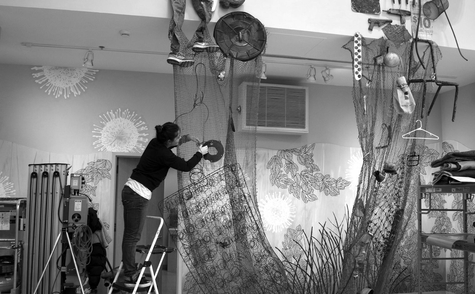 Image of the installation process for River of Trash (2017) at the Turchin Center for Visual Arts in Boone, North Carolina.
