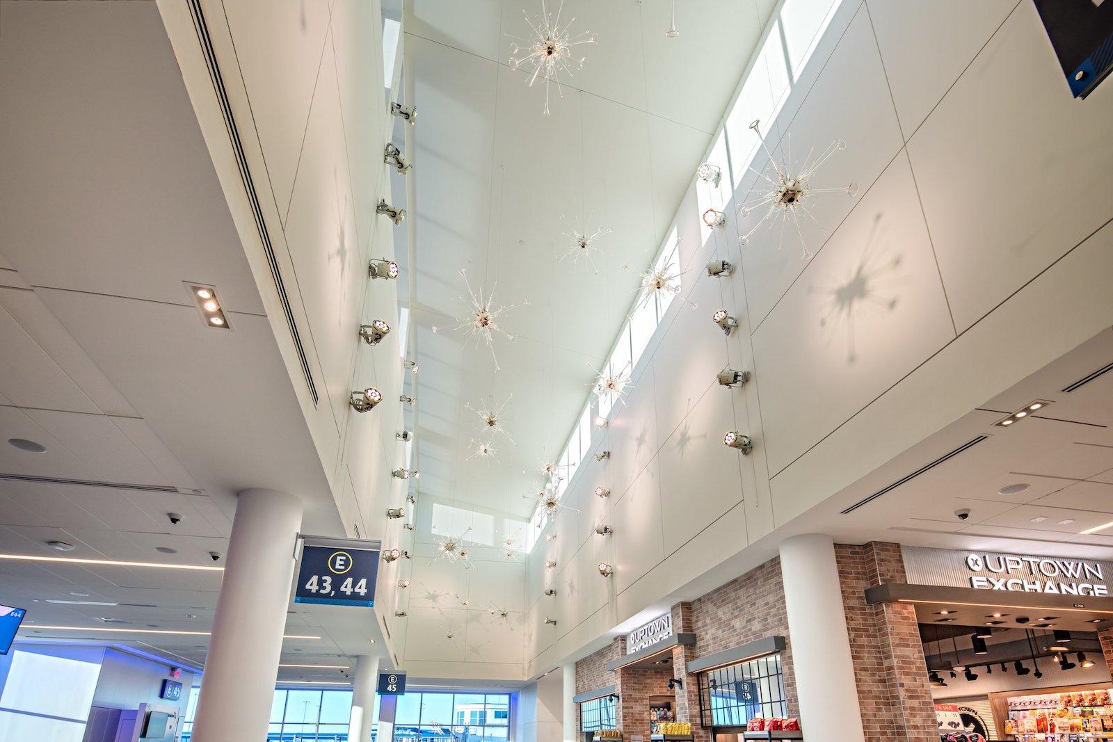 Installation view of Antinomies, 2022. East clerestory of Concourse E at CDIA. Photo by Stanley Capps.