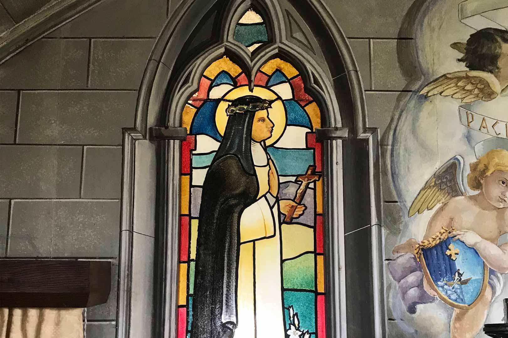 Painted glass window in the Italian Chapel.
