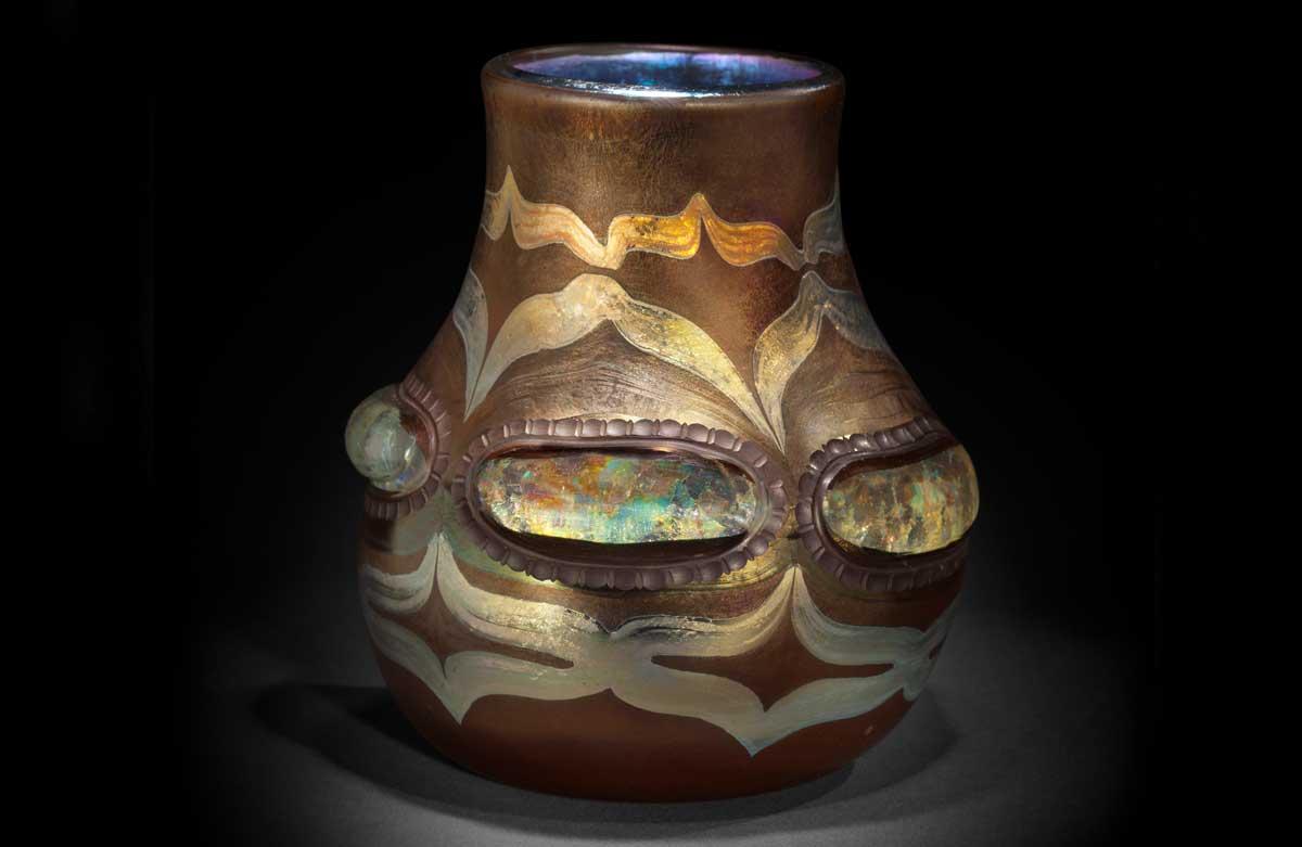Tiffany Studios, Vase, blown, iridized, and engraved glass with applied and tooled decoration.