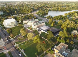 Aerial view of the museum's campus, including a rendering of the new Gundlach Building, Great Lawn, and indoor Town Square covered by Olafur Eliasson and Sebastian Behmann's Common Sky.