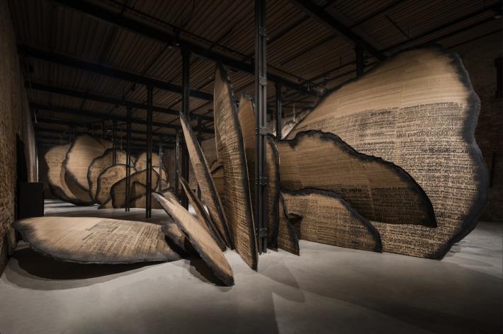 Installation view, Manal AlDowayan, Shifting Sands: A Battle Song, 2024, Pavilion of Saudi Arabia. Multimedia installation, Tussar silk, ink, acrylic paint. Dimensions variable. Sound, multichannel, 30’48”. Photography by venicedocumentationproject. Courtesy of the Visual Arts Commission, the Commissioner for the National Pavilion of Saudi Arabia.