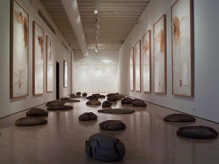 Andy Goldsworthy, Earth and Snow (on walls), 1995 and Rock Pools, 2000, and Surface Tension (on floor), 1993.