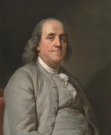 Benjamin Franklin sits facing the right of the picture frame but looking directly at the viewer.