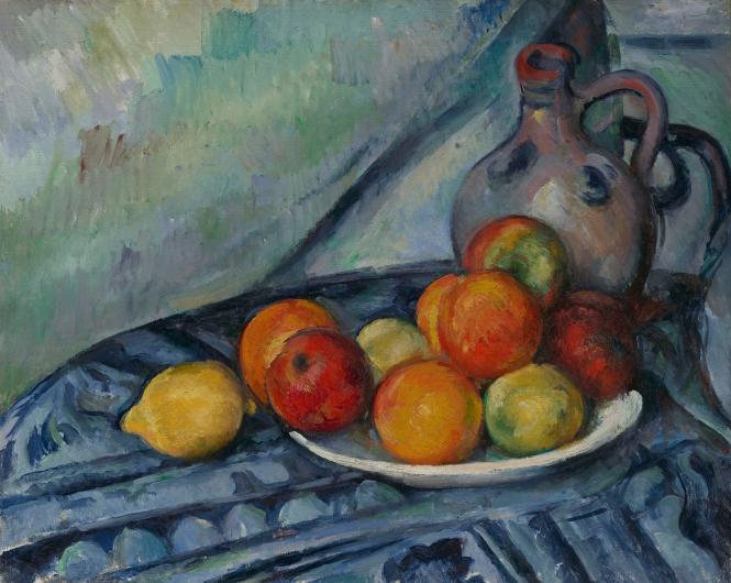 Cezanne still life of a plate of fruit on a blue table with a water jug behind it
