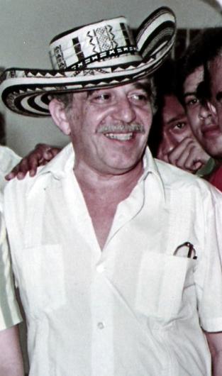 Famed Colombian author Gabriel Garcia Marquez wearing a typical black and white sombrero vueltiao. These hats can be spotted throughout the background of Encanto. Wikimedia Commons.