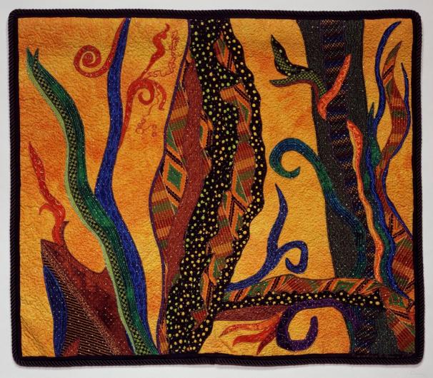 Gwendolyn A. Magee quilt art using african fabrics in an abstracted organic design