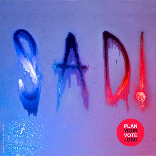 poster that says "SAD!" in dripping, bright letters