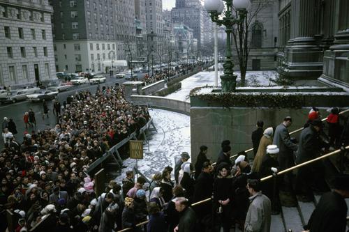 The Metropolitan Museum of Art, exterior, during the exhibition, The Mona Lisa by Leonardo da Vinci, February 7- March 4, 1963; view facing south showing crowds lined up on Fifth Avenue and on the front steps of the Museum.