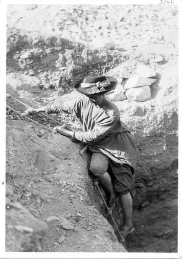 Hilda Petrie descending a ladder into an Egyptian Tomb. Courtesy of Egypt Exploration Society.