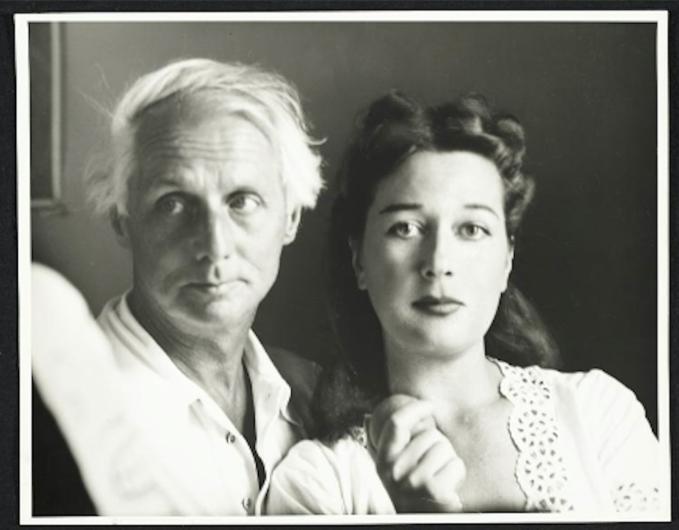 couple posed in headshot, black and white 