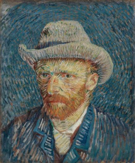 Van Gogh in front of a pointalist, blue background in a blue jacket and grey hat. The use of various colors is incredibly striking in this portrait.  