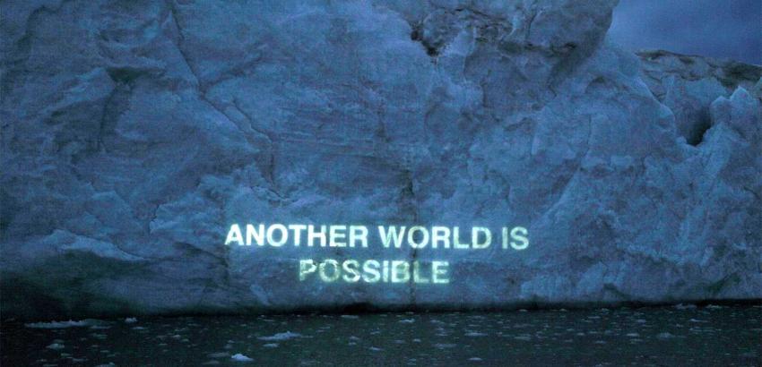 Another World is Possible, Ice Text projection, David Buckland.