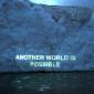 Another World is Possible, Ice Text projection, David Buckland.