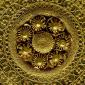 Detail shot of a gold ear-stud: disc decorated with granulation, filigree and beaded wire. 530BC-500BC